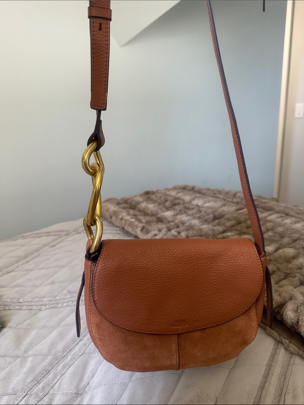 Vince Camuto Two-Tone Cognac Saddle Crossbody with Gold Chain Accent